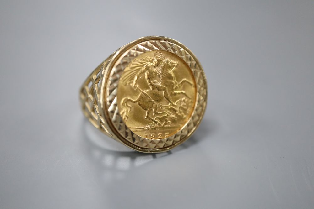 A George V 1925 gold half sovereign, now in 9ct gold ring mount, size V, gross 7.9 grams.